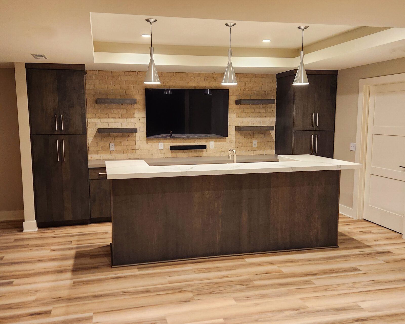 Basement bar with quartz top and backsplash