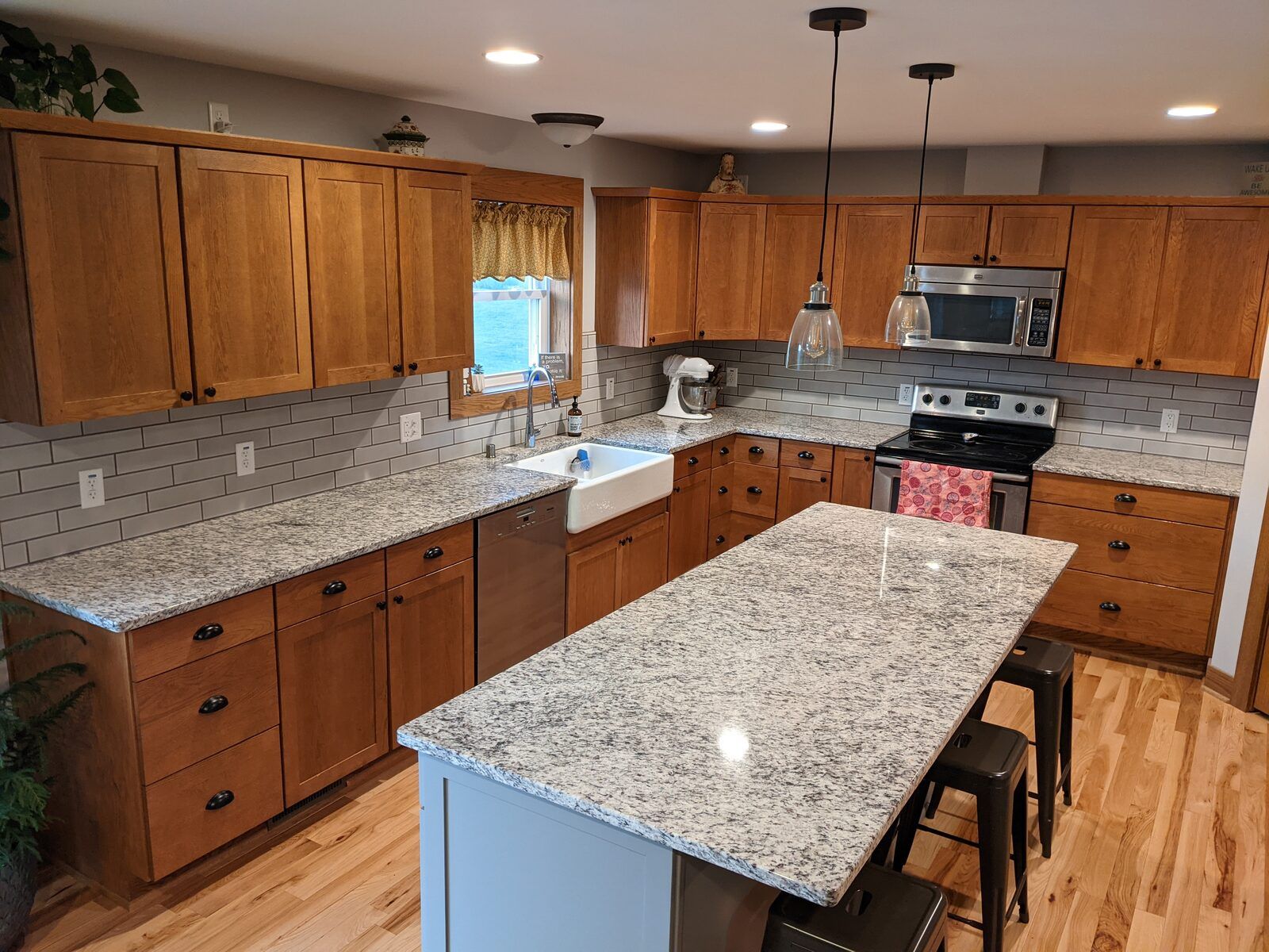 Granite kitchen countertops with farmhouse sink